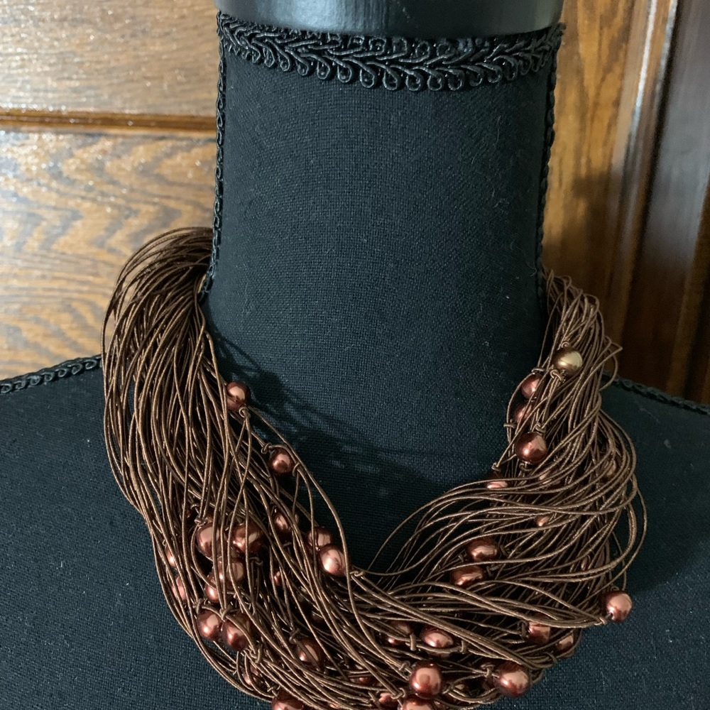 Woman’s Copper beaded necklace.